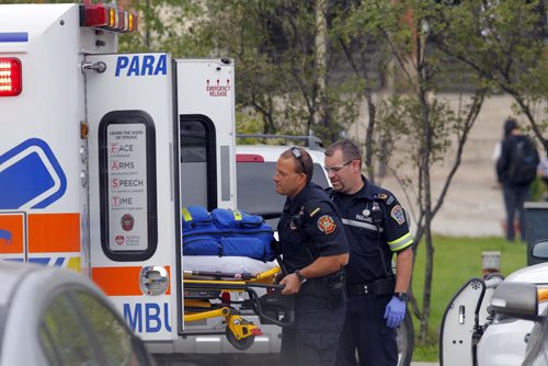 Police and Fire at Tec Voc high school where there was a possible pepper spray incident. EDS NOTE: photographed students from street. BORIS MINKEVICH / WINNIPEG FREE PRESS PHOTO Sept. 16, 2015