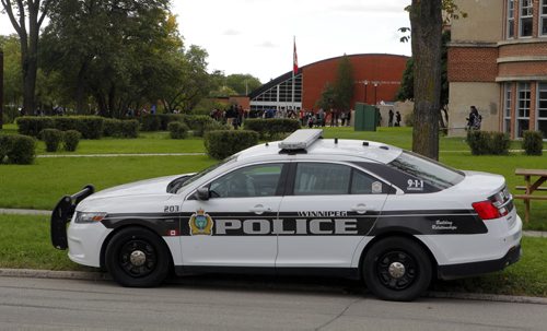 Police and Fire at Tec Voc high school where there was a possible pepper spray incident. EDS NOTE: photographed students from street. BORIS MINKEVICH / WINNIPEG FREE PRESS PHOTO Sept. 16, 2015