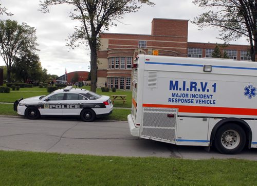 Police and Fire at Tec Voc high school where there was a possible pepper spray incident. EDS NOTE: photographed students from street. BORIS MINKEVICH / WINNIPEG FREE PRESS PHOTO Sept. 16, 2015