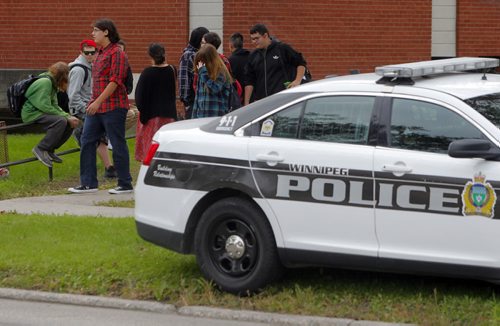 Police and Fire at Tec Voc high school where there was a possible pepper spray incident. EDS NOTE: photographed students from street. BORIS MINKEVICH / WINNIPEG FREE PRESS PHOTO Sept. 16, 2015