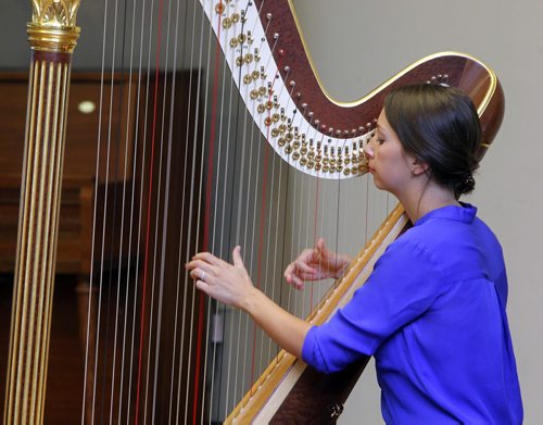 LOCAL - Manitoba Harpist Vocalist Janelle Nadeau performs at the launch of Concerts in Care at LAccueil, Colombien, Inc, a senior residence in St. Boniface (200 Masson Street). For Jen Zoratti column on the program. BORIS MINKEVICH / WINNIPEG FREE PRESS PHOTO Sept. 16, 2015