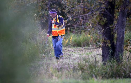 Bill McCausland continues the search for Thelma Krull, Wednesday, September 16, 2015. (TREVOR HAGAN/WINNIPEG FREE PRESS)