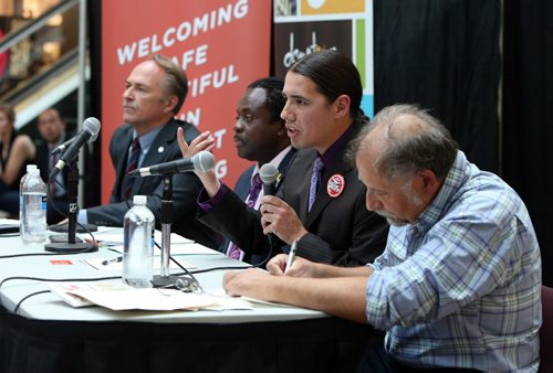 Federal election candidates (from left) Pat Martin (New Democratic Party), Don Woodstock (Green Party), Robert-Falcon Ouellette (Liberal Party) and Darrell Rankin (Communist Party) discuss their platforms on key downtown issues at a forum hosted by the Downtown Winnipeg BIZ at Portage Place Shopping Centre on Sept. 16, 2015. Photo by Jason Halstead/Winnipeg Free Press