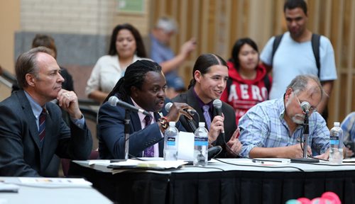 Federal election candidates (from left) Pat Martin (New Democratic Party), Don Woodstock (Green Party), Robert-Falcon Ouellette (Liberal Party) and Darrell Rankin (Communist Party) discuss their platforms on key downtown issues at a forum hosted by the Downtown Winnipeg BIZ at Portage Place Shopping Centre on Sept. 16, 2015. Photo by Jason Halstead/Winnipeg Free Press