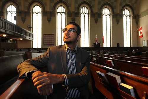 Syria Assembly of Manitoba Tarek Habasht sits in a pew at Knox United Church following interviews after press conference with Premier Selinger announcing deeper commitment for Syrian refugees Thursday.   See Carol Sanders story   Sept 17, 2015 Ruth Bonneville / Winnipeg Free Press