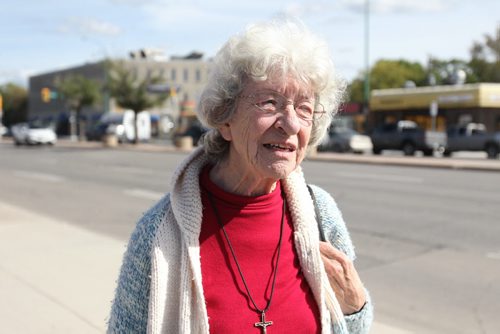 Winnipeg Centre resident Margot Lavoi, gives her thoughts and opinions on the tight race in the Pat Martin and Robert Falcon Quellette  (Winnipeg Centre) riding on Portage Ave. Friday afternoon.   See MA election story.  See To go with MA's election story and streeter photos.    Sept 18, 2015  Ruth Bonneville / Winnipeg Free Press