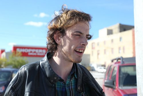 Winnipeg Centre resident Russell Pilon gives his thoughts and opinions on the tight race in the Pat Martin and Robert Falcon Quellette  (Winnipeg Centre) riding on Portage Ave. Friday afternoon.   See MA election story.   Sept 18, 2015  Ruth Bonneville / Winnipeg Free Press