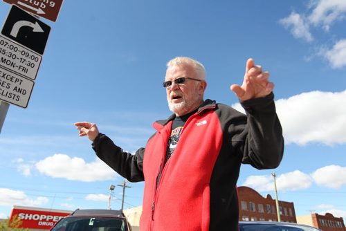 Winnipeg Centre resident Donald Swansoni, gives his thoughts and opinions on the tight race in the Pat Martin and Robert Falcon Quellette  (Winnipeg Centre) riding on Portage Ave. Friday afternoon.   See MA election story.   Sept 18, 2015  Ruth Bonneville / Winnipeg Free Press
