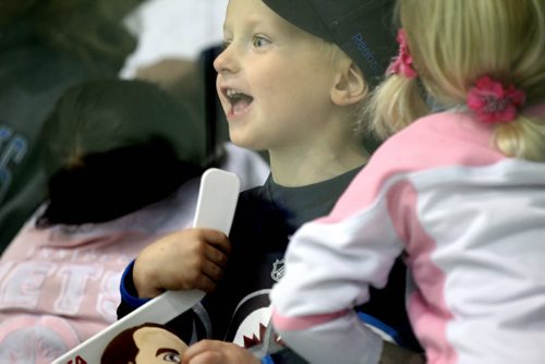 Tyler Acheson 3yrs, shows his excitement as the Jets practice on the ice at Iceplex  during the annual Jets Fanfare Saturday. Standup Sept 18, 2015   Ruth Bonneville /Winnipeg Free Press