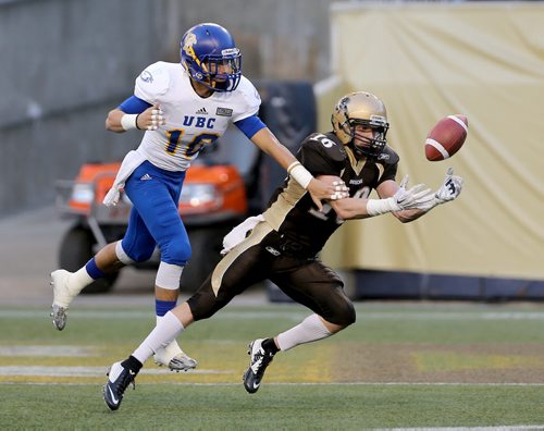 University of British Columbia Thunderbirds' Stavros Katsantonis (18), breaks up a pass in the end zone, intended for University of Manitoba Bisons' Bryden Bone (16) during the first half of their game, Saturday, September 19, 2015. (TREVOR HAGAN/WINNIPEG FREE PRESS)