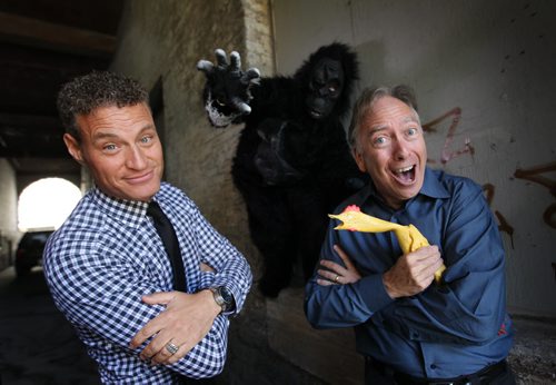 Mike Easton, President and CEO of Argus (left) and Michael Kerr author of Humour at Work believe that injecting laughter into the workplace can raise the bottom line of the company profits.  Easton regularly introduces costumes like this gorilla costume into the workplace by hiding them in shipment boxes for employees to open to lighten employees moods.  See Geoff Kirbyson's story.   Sept 22, 2015   Ruth Bonneville /Winnipeg Free Press