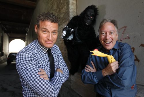 Mike Easton, President and CEO of Argus (left) and Michael Kerr author of Humour at Work, believe that injecting laughter into the workplace can raise the bottom line of the company profits.  Easton regularly introduces costumes like this gorilla costume into the workplace by hiding them in shipment boxes to surprise employees to lighten  moods and work environment .   See Geoff Kirbyson's story.   Sept 22, 2015   Ruth Bonneville /Winnipeg Free Press