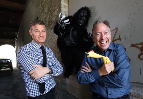 Mike Easton, President and CEO of Argus (left) and Michael Kerr author of books on humour at work, believe that injecting laughter into the workplace can raise the bottom line of the company profits.  Easton regularly introduces costumes like this gorilla costume into the workplace by hiding them in shipment boxes for employees to open to lighten employees moods.  See Geoff Kirbyson's story.   Sept 22, 2015   Ruth Bonneville /Winnipeg Free Press