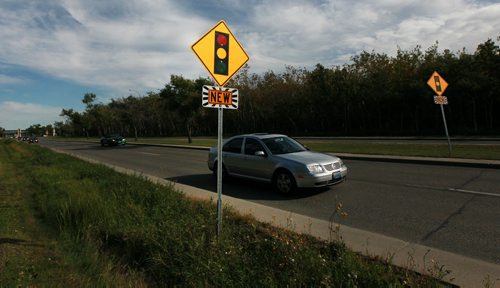 Traffic signs installed backwards untill the NEW lights they are indicating on Grant Ave are turned on . Then they will be turned facing traffic. September 22,2015 - (PHIL HOSSACK / WINNIPEG FREE PRESS)