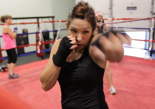 Kelly Porath limbers up in the squared ring Wednesday evening prepping for a charity bout. See Melissa Martin's story. September 23, 2015 - (PHIL HOSSACK / WINNIPEG FREE PRESS)