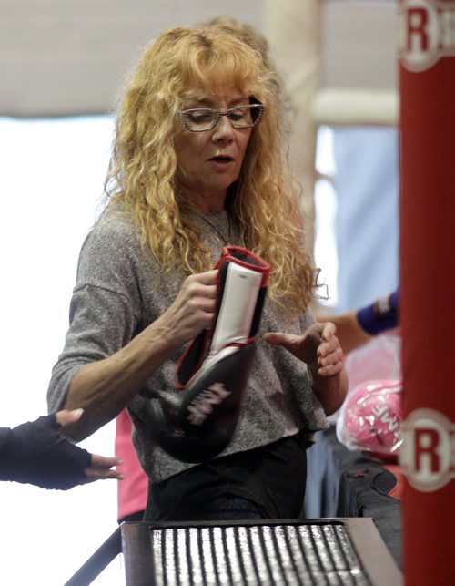 Women's coach Maureen Black unpacks gloves, prepping for a charity bout. See Melissa Martin's story. September 23, 2015 - (PHIL HOSSACK / WINNIPEG FREE PRESS)