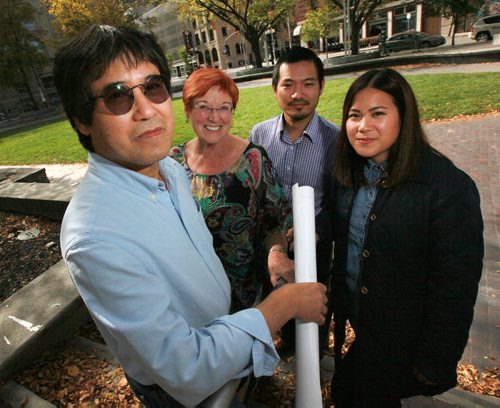 Left to Right, Thongsay (Ken) Phanlouvong is vice president and founder, Linda Lindsay, Setha Phanlouvong and Ari Phanlouvong, all of School For Kids in Laos the schools. See Kevin Rollason story. September 23, 2015 - (PHIL HOSSACK / WINNIPEG FREE PRESS)