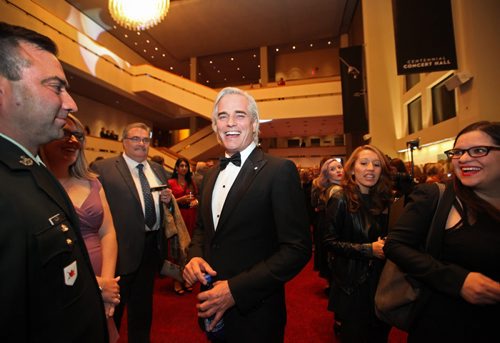 Paul Gross is all smiles as he chats  with fellow crew members of  Hyena Road and the VIP crowd on the second level of the Centennial Concert Hall Wednesday evening just prior to an exclusive screening of the show.   Sept 23, 2015 Ruth Bonneville / Winnipeg Free Press
