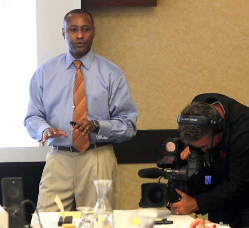 Training workshop currently underway on the topic of Fair and Impartial Policing. Chief (Ret.) Noble Wray, who spent 30 years with the Madison Wisconsin Police Department talks to WPS executive.  Canad Inns. BORIS MINKEVICH / WINNIPEG FREE PRESS PHOTO Sept. 24, 2015