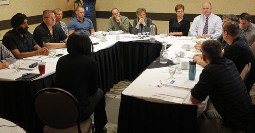 Training workshop currently underway on the topic of Fair and Impartial Policing at Canad Inns Polo Park. Retired Lt. Sandra Brown, from Palo Alto, CA, works with police officers. BORIS MINKEVICH / WINNIPEG FREE PRESS PHOTO Sept. 24, 2015