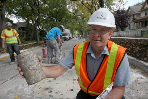 Murray Peters-Streets engineering technician with the City of Winnipeg holdingConcrete core samples- from Mulvey Ave  - joint research project with the University of Manitoba - See Gordon Sinclair story- Sept 25, 2015   (JOE BRYKSA / WINNIPEG FREE PRESS)