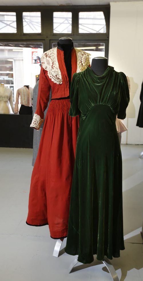 49.8 - THREADS - The Costume Museum popup exhibit called Fabrication Fashion at 296 McDermot Ave. Sept 26-Oct 23. At right,  a green velvet  dress from 1930's  and at left red dress from  turn of the century with lace mechanically made so the lace was probably imported. Wayne Glowacki / Winnipeg Free Press September 25 2015
