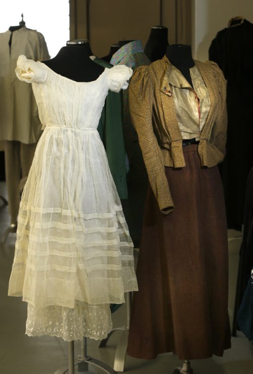 49.8 - THREADS - The Costume Museum popup exhibit called Fabrication Fashion at 296 McDermot Ave. Sept 26-Oct 23.  These two garments are some of the oldest  in the exhibit. At left is a girl's dress from the 1860's and at right is a  ladies suit , the skirt is home spun fabric and also has hand sewing. Wayne Glowacki / Winnipeg Free Press September 25 2015