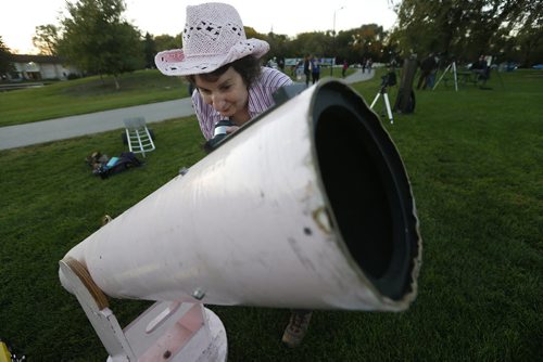 September 27, 2015 - 150927  -  Gail Wise of the Royal Astronomical Society joined other Winnipeggers who come out to view the eclipse of the moon at Assiniboine Park Sunday, September 27, 2015.  John Woods / Winnipeg Free Press