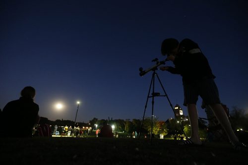 September 27, 2015 - 150927  -  Winnipeggers come out to view the eclipse of the moon at Assiniboine Park Sunday, September 27, 2015.  John Woods / Winnipeg Free Press