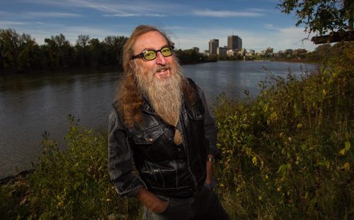 Jordan van Sewell, artist, down by the Red River at the end of his street in Point Douglas where he hopes a "parkette" will be created to provide access to the river for canoeists and kayakers. 150929 - Tuesday, September 29, 2015 -  MIKE DEAL / WINNIPEG FREE PRESS