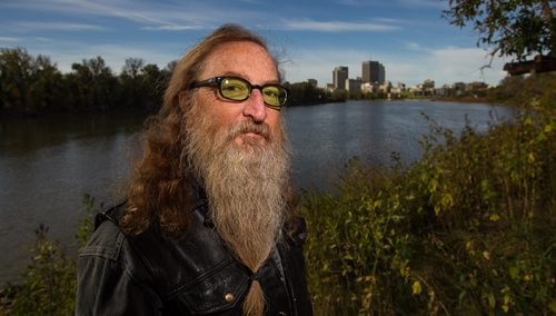 Jordan van Sewell, artist, down by the Red River at the end of his street in Point Douglas where he hopes a "parkette" will be created to provide access to the river for canoeists and kayakers. 150929 - Tuesday, September 29, 2015 -  MIKE DEAL / WINNIPEG FREE PRESS