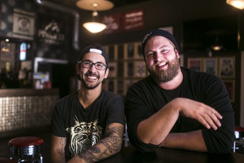 Triggers band members Kyle Monkman, left, and Braden Wilks reminisce about times had in The Park theatre in Winnipeg on Wednesday, Sept. 23, 2015.   Mikaela MacKenzie / Winnipeg Free Press