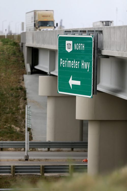 A semi merges from CentrePort Canada Way onto the West Perimeter, Wednesday, September 30, 2015. (TREVOR HAGAN/WINNIPEG FREE PRESS)