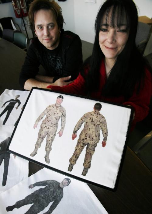 John Woods / Winnipeg Free Press / January 3, 2008- 080103  - Mandi Hein and Darren Steen, manager of Shirtfire, pose with templates of a military doll that Hein is producing at Steen's company Thursday January 3, 2003.