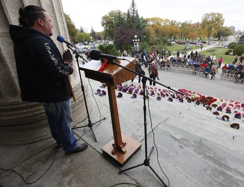 October 4, 2015 - 151004  -   Derek Nepinak, grand chief of Manitoba First Nation, speaks on the steps of the Manitoba Legislature at a gathering Sunday, October 4, 2015. The event is part of a  National  Day of Action for Violence Against Indigenous Women and taking place in various cities today. John Woods / Winnipeg Free Press