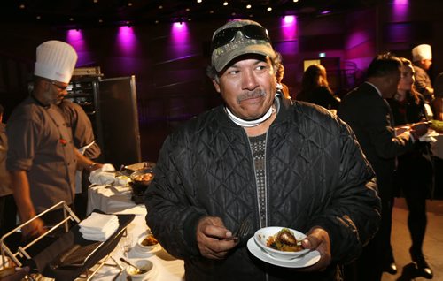Wesley Catcheway, a commercial fisherman on Waterhen Lake samples the pickerel caught by band members that was served at the announcement that Club Regent Casino and the McPhillips Station Casino will be serving certified sustainable Manitoba harvested pickerel. The event was held Monday at the Club Regent Casino.    Alex Paul story  Wayne Glowacki / Winnipeg Free Press October 5 2015