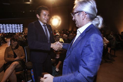 October 5, 2015 - 151005  - Wab Kinew (L) greets his uncle Phil Fountaine at his book launch for The Reason You Walk at the Canadian Museum For Human Rights Monday, October 5, 2015.  John Woods / Winnipeg Free Press