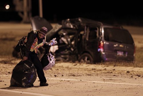October 5, 2015 - 151005  -  A man leaves a semi as RCMP investigate a semi/minivan collision on the perimeter just north of Dugald Road Monday, October 5. John Woods / Winnipeg Free Press