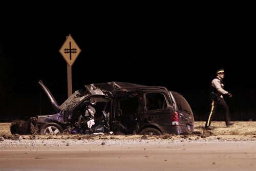 October 5, 2015 - 151005  -  RCMP investigate a semi/minivan collision on the perimeter just north of Dugald Road Monday, October 5. John Woods / Winnipeg Free Press