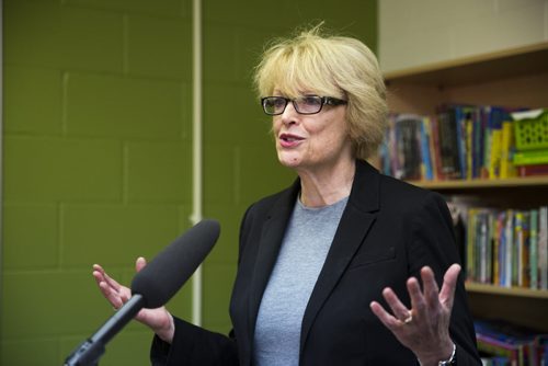 Pauline Clark, chief superintendent of the Winnipeg School  Division, speaks about the expansion of the COACH program for at-risk youth at the Mission Baptist Church in Winnipeg on Tuesday, Oct. 6, 2015.  (Mikaela MacKenzie/Winnipeg Free Press)