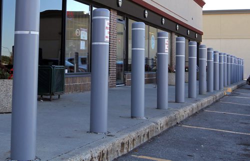 Bollards in front of the MLCC store on Madison near Polo Park. BORIS MINKEVICH / WINNIPEG FREE PRESS  OCT 6, 2015