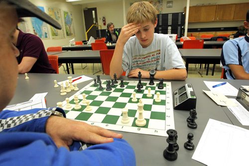 Players go head to head at  Chess Manitoba's weekly tournament at U of W. Theo Wolchock, left. BORIS MINKEVICH / WINNIPEG FREE PRESS  OCT 6, 2015