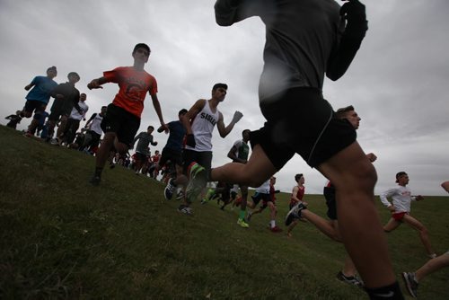 Boys in the  senior division make their way down the hill at Woodsworth Park after leaving the start line as  they compete in a Winnipeg One School Division cross-country race Wednesday afternoon.   Standup photo  Oct 07, 2015 Ruth Bonneville / Winnipeg Free Press
