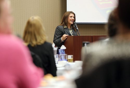 Guest speaker Michelle Clarke, assistant superintendent of the St. James-Assiniboia School Division, speaks at Bookmates' fifth annual Breakfast With Bookmates event Oct. 7, 2015 at the Viscount Gort Hotel. Proceeds from the event support Bookmates family literacy programs in communities around the province. Photo by Jason Halstead/Winnipeg Free Press