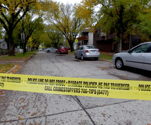 Crime scene in the 400 block of Flora Ave. BORIS MINKEVICH / WINNIPEG FREE PRESS  OCT 8, 2015