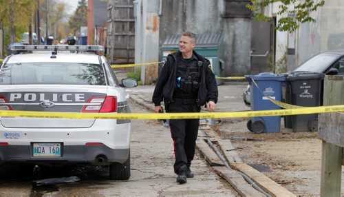 Crime scene in the 400 block of Flora Ave. BORIS MINKEVICH / WINNIPEG FREE PRESS  OCT 8, 2015