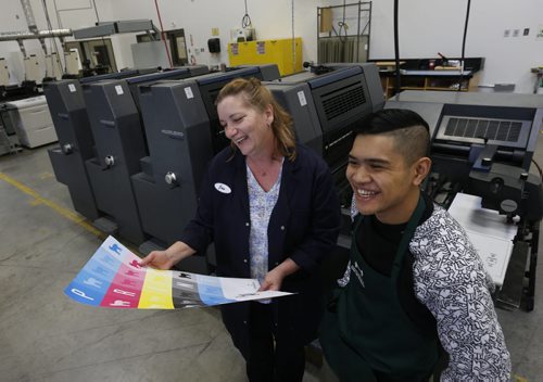 Jan Hamilton, Graphic and Print Technician with first year student Justin Dela Cruz by the four colour offset printing press at Manitoba Institute of Trades and Technology.  Martin Cash story Wayne Glowacki / Winnipeg Free Press October 8 2015