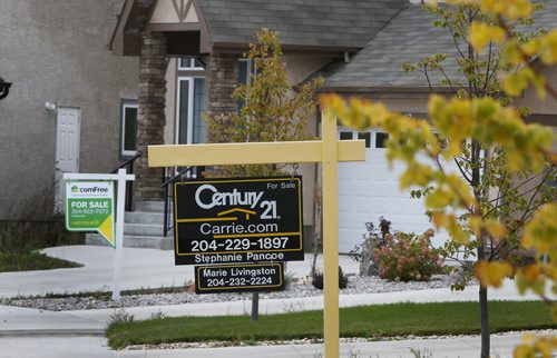 Finance. For Sale signs for houses in Bridgwater Forest.  Its to go with a story on Septembers MLS sales and housing start numbers. It was a good month for both MLS sales and housing starts. Murray McNeill story.  Wayne Glowacki / Winnipeg Free Press October 8 2015