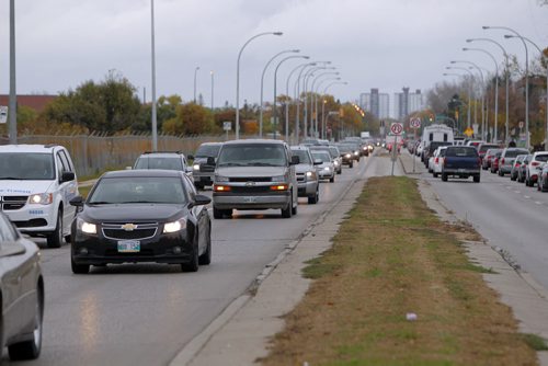 Traffic on Keniston near Kapyong Barracks. BORIS MINKEVICH / WINNIPEG FREE PRESS  OCT 8, 2015