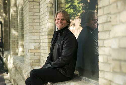 Architect Brent Bellamy poses for portraits outside his office in the Exchange District for The Rivers project  in Winnipeg on Friday, Oct. 9, 2015.  (Mikaela MacKenzie/Winnipeg Free Press)